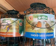 caged seed feeder
